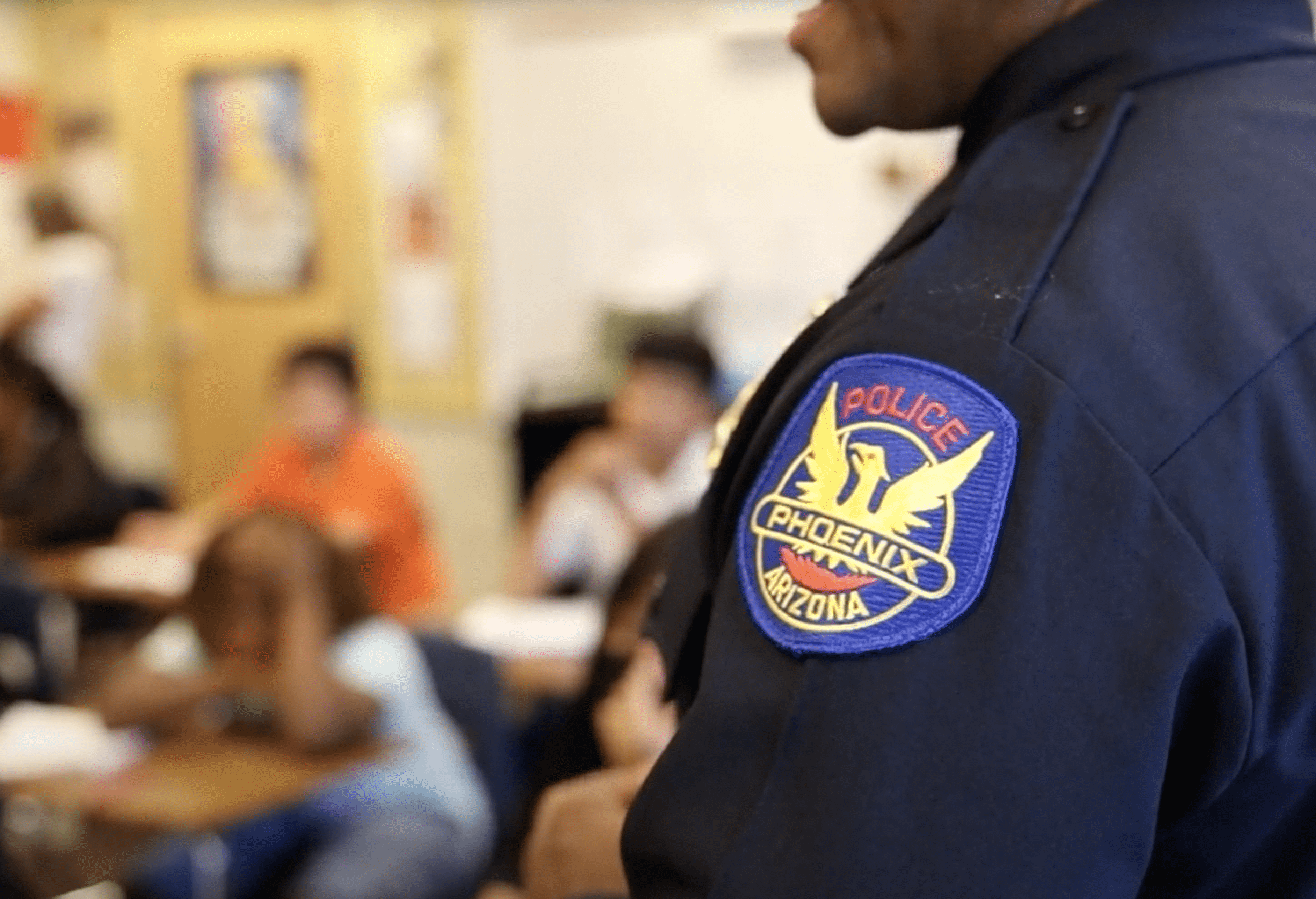 This photo shows a close-up of a Phoenix Police Department officer's uniform patch.